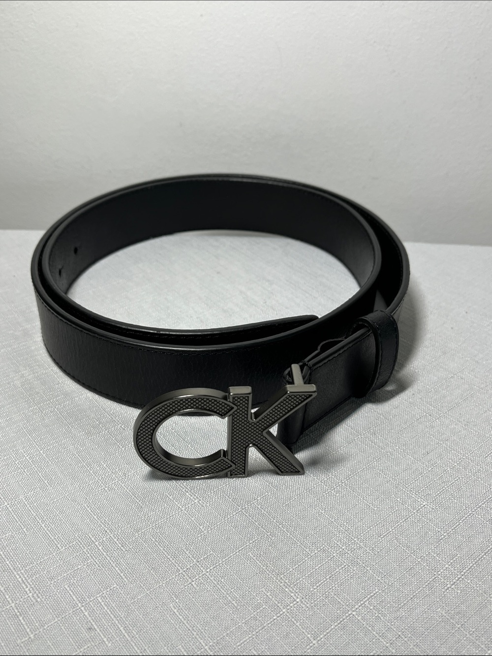 Calvin Klein Black Leather Belt with Brushed Gunmetal CK Buckle
New
Size 38